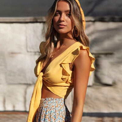 Bodycon Cropped Sleeveless Top with model wearing a yellow headband.