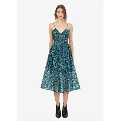 Blue Sequin Spaghetti Classic Dress for Women front view style paired with black Chelsea boots.