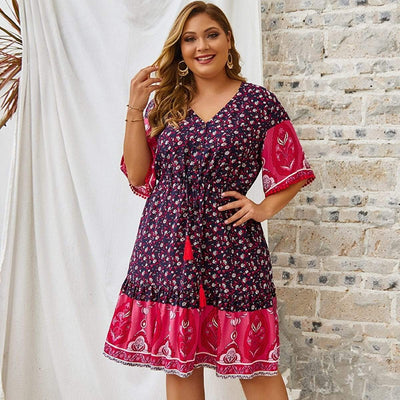 A lady wearing Bohemian Plus Size Beach Dress front view paired with accessories.