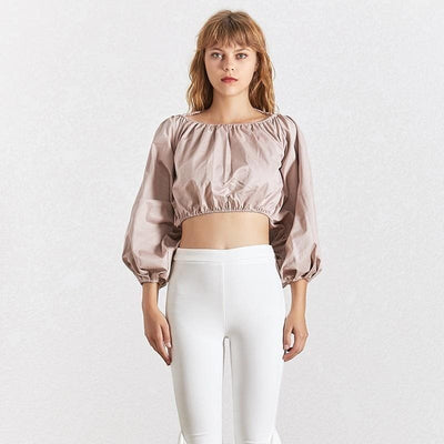 Backless Lantern Sleeve  Crop Top Blouse With model wearing white tights.