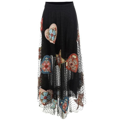 Black Beaded Tulle Maxi Skirt has a colorful front view.