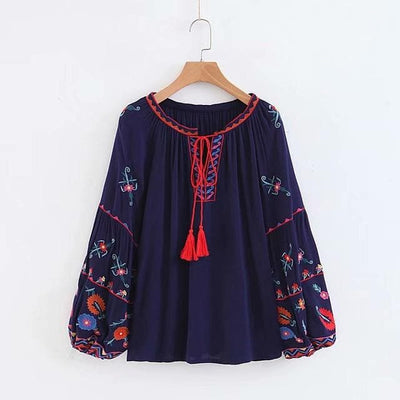 Bohemian Embroidered Tunic Blouse in a hanger front full view